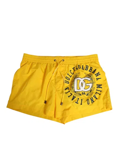 DOLCE & GABBANA DOLCE & GABBANA YELLOW NYLON LOGO PRINT MEN BOXER SHORT MEN'S SWIMWEAR