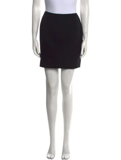 Pre-owned Donna Karan Virgin Wool Mini Skirt In Black