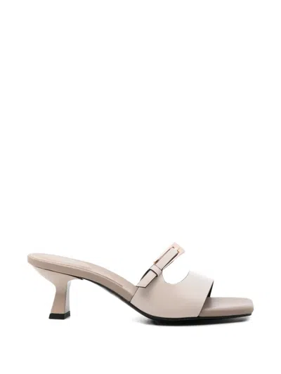 Donnari Buckle Leather Sandals In Neutral