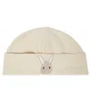 Donsje Baby Peller Hat In Warm White