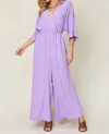 Double Take Chic Surplice Wide Leg Jumpsuit In Lavender In Purple
