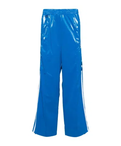 Doublet Laminate Track Embroidered Sweatpants In Blue