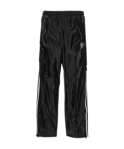 DOUBLET PATENT-FINISH TROUSERS