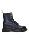 Dr. Martens 1460 Vegan Felix Rub Off Booties In Black