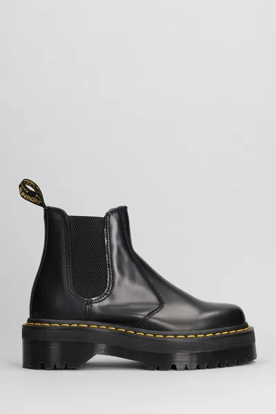 Dr. Martens' 2976 Quad Combat Boots In Black Leather