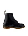 Dr. Martens' 1460 Lace-up Combat Boots In Smooth Leather In Black Smooth