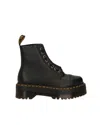 Dr. Martens Sinclair Combat Boot In Black Hammered Leather With A Large Treaded Sole In Black Milled Nappa