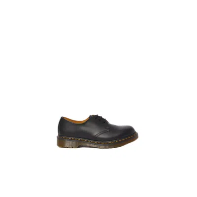 Dr. Martens' Black Leather Flat Shoe