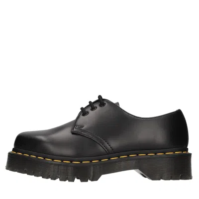 Dr. Martens Flat Shoes In Nero Scuri