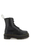 Dr. Martens' Platform Boots With Treaded Sole And Distinctive Accents In Black