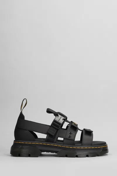 DR. MARTENS' PEARSON SANDALS IN BLACK LEATHER