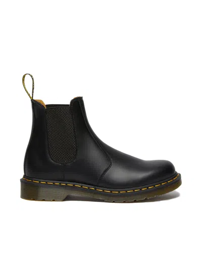 Dr. Martens Chelsea Boot With Distinctive Yellow Stitching And Comfortable Sole In Black