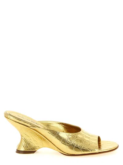 Dries Van Noten Curved Wedge Mules In Gold