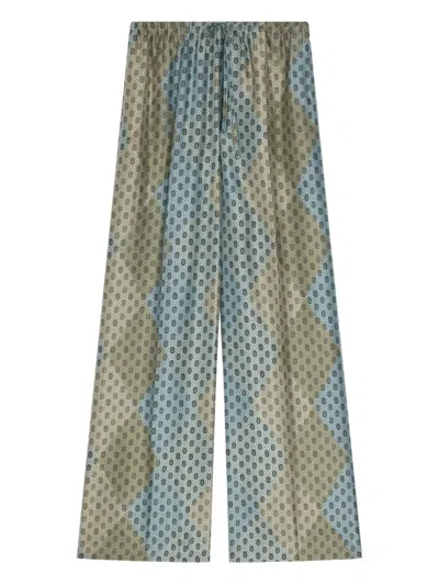 DRIES VAN NOTEN GEOMETRIC-PATTERN ELASTICATED TROUSERS