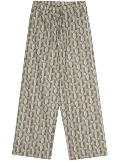 Dries Van Noten Graphic Print Trousers In Gold