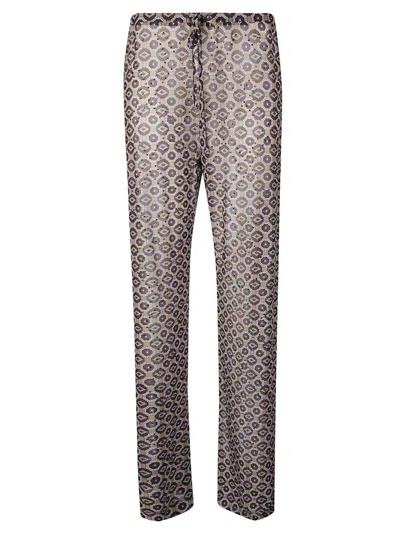 DRIES VAN NOTEN MESH TROUSERS WITH GLITTER ACCENTS