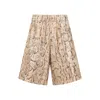 Dries Van Noten Animal Print Sequin Embellished Knee-length Shorts In Beige