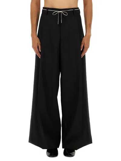 DRIES VAN NOTEN PANTS WITH PLEATS