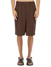 Dries Van Noten Crinkled Knee Length Pleated Bermuda Shorts In Brown