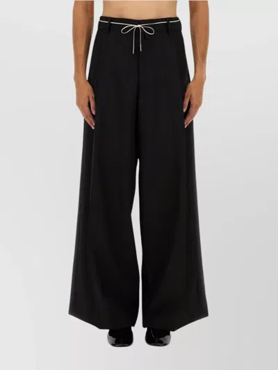 DRIES VAN NOTEN WIDE-LEG TROUSERS FEATURING PLEATED FRONT