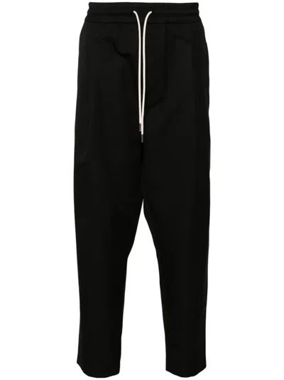 Drôle De Monsieur Cropped Trousers With Elastic Waistband And Pleated Details In Black