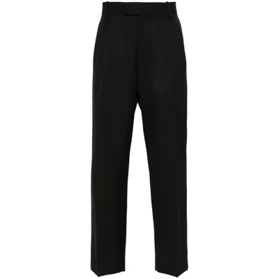 Drôle De Monsieur Logo-embroidered Trousers In Black