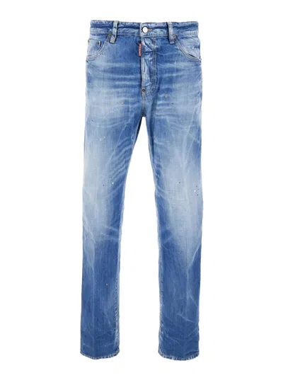 DSQUARED2 BLUE JEANS WITH DISTRESSED EFFECT AND LOGO PATCH ON THE BACK IN DENIM MAN