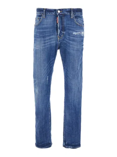DSQUARED2 BLUE JEANS WITH RIPPED DETAILS AND LOGO PATCH ON THE REAR IN DENIM MAN