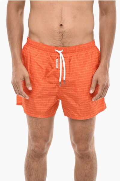 Dsquared2 Boxer Swim Shorts With Allover Logo Print In Orange