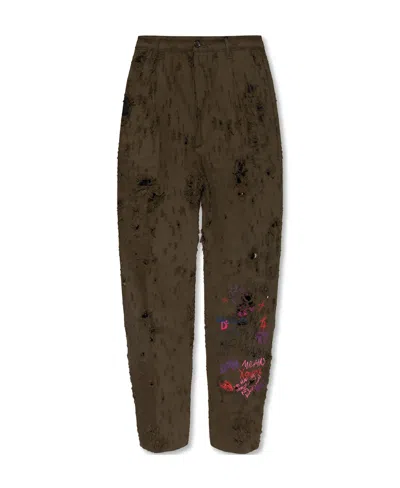 DSQUARED2 DISTRESSED GRAFFITI-PRINT TROUSERS