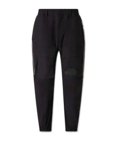 Dsquared2 Logo Printed Tapered-leg Trousers In Black
