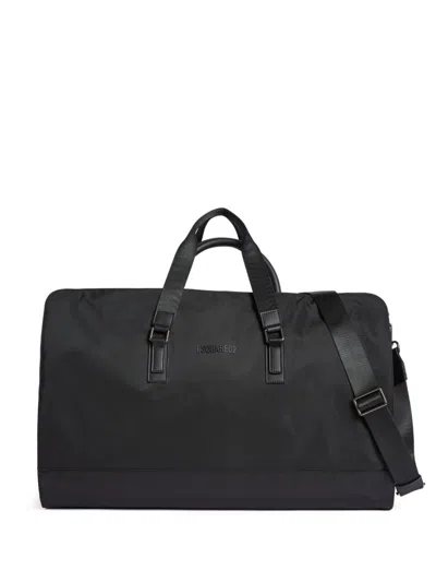 Dsquared2 Logo-raised Zipped Duffle Bag In Black