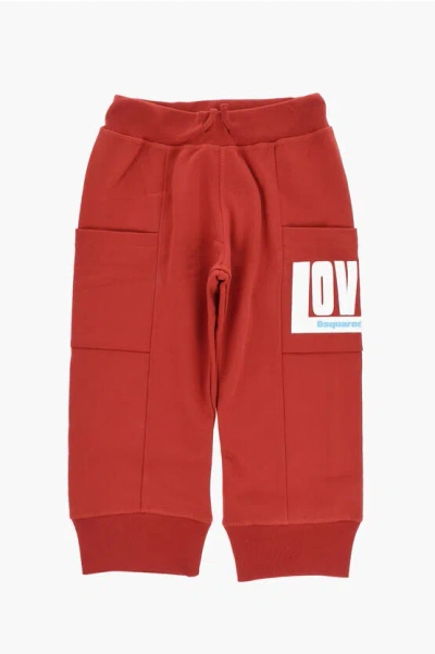 Dsquared2 Solid Color Joggers With Embossed Detail In Red