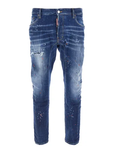 DSQUARED2 'TIDY BIKER' BLUE JEANS WITH PAINT EMBELLISHMENTS AND LOGO PATCH ON THE REAR IN DENIM MAN