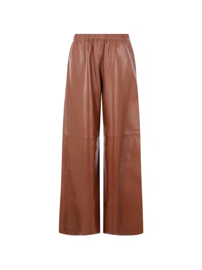 Dušan Elasticated Leather Trousers In Brown