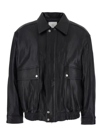 DUNST BLACK JACKET WITH TWO FRONT POCKETS AND DISTRESSED EFFECT IN LEATHER WOMAN