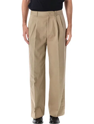 Dunst Pleated Cotton Trousers In Gold