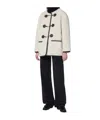 Dunst Collarless Buckled Shearling Jacket Cream In White