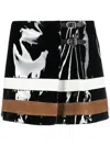 Durazzi Milano Buckle-fastening Patent-leather Miniskirt In Black