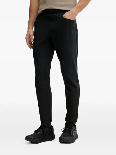 Dynafit Traverse Hybrid Dynastretch Logo-patch Track Pants In Black