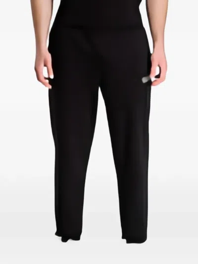 Ea7 Logo Series Track Pants In Black