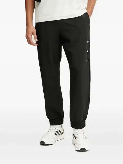 Ea7 -logo Sweatpants In Black
