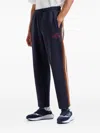 Ea7 Stretch-cotton Track Pants In Black