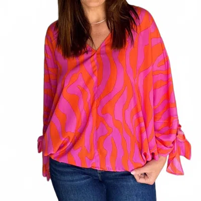 Easel Light Me Up V-neck Blouse In Pink/multi