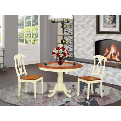 East West Furniture 3 Pc Set With A Round Kitchen Table And 2 Wood Dinette Chairs In Buttermilk And Cherry . In Brown