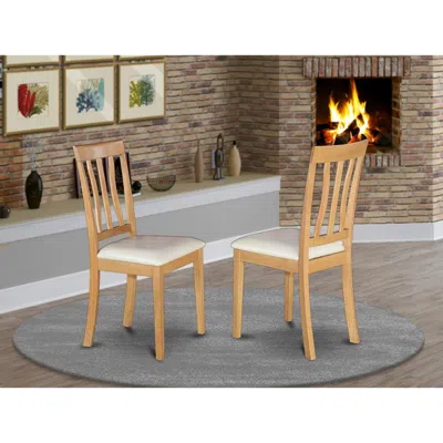 East West Furniture Antique Chair For Dining Room Faux Leather Seat With Oak Finish, Set Of 2