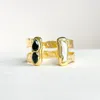Easton Elle Women's Midnight Pearl Double Cuff In Gold/black In Black
