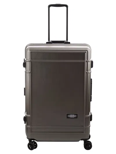 Eastpak Hard Shell Polycarbonate Suitcase With Multidirectional Wheels In Brown