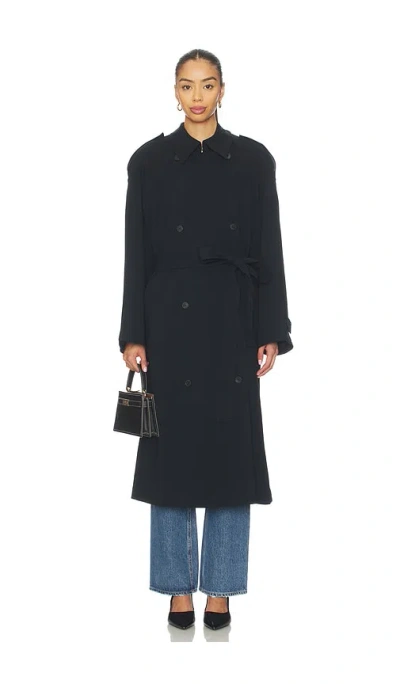 Eaves Lumi Trench Coat In Black