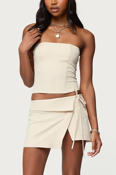 Edikted Selena Asymmetric Wrap Mini Skirt In Beige, Women's At Urban Outfitters In Neutral